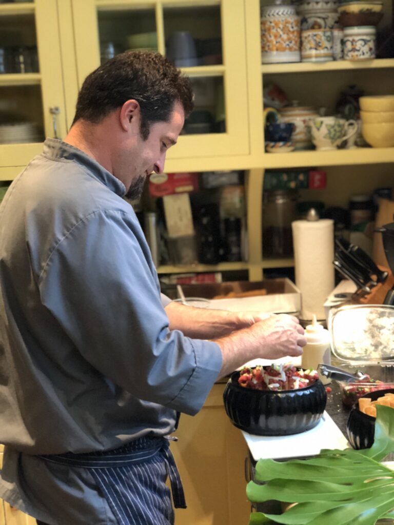 Chef preparing food in a kitchen